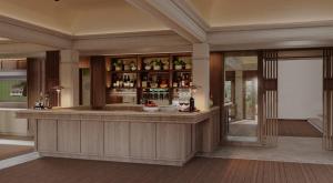 a lobby with a bar in a building at La Résidence Phou Vao in Luang Prabang +43 photos