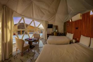 Postel nebo postele na pokoji v ubytování The Rock Camp Petra + 78 fotografií