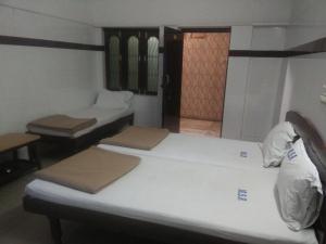 Postel nebo postele na pokoji v ubytování MSR Lodge