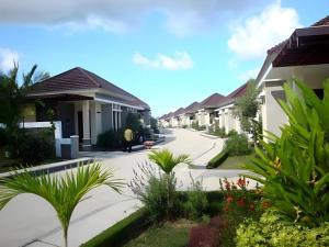 a row of houses in a residential neighborhood at The Luxio Hotel in Sorong