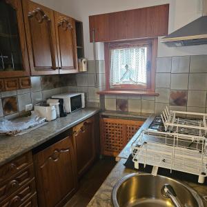 Kuchyň nebo kuchyňský kout v ubytování Cesira