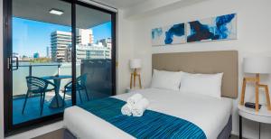 a hotel room with a view of the ocean at Annexe Apartments in Brisbane