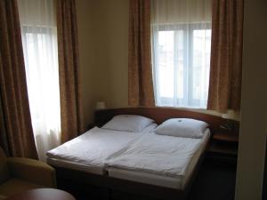 Postel nebo postele na pokoji v ubytování Hotel Christinenhof garni - Bed & Breakfast