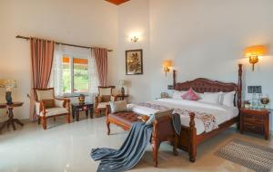 Ένα ή περισσότερα κρεβάτια σε δωμάτιο στο amã Stays & Trails - White Hackle General's Retreat