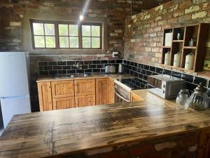 Η κουζίνα ή μικρή κουζίνα στο Vallombrosa Cottage +19 φωτογραφίες