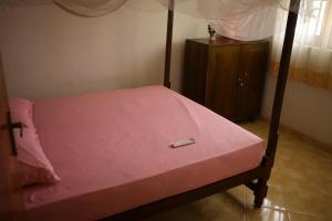 Ένα ή περισσότερα κρεβάτια σε δωμάτιο στο J&M Nest