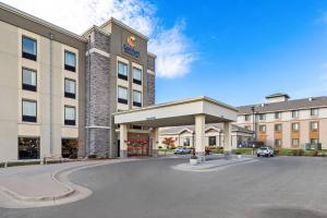 a rendering of the front of a hotel at Comfort Inn & Suites West - Medical Center in Rochester