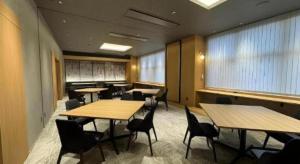 a conference room with tables and chairs and windows at Hotel Obokekyo Mannaka in Miyoshi +95 photos