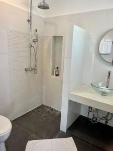 a white bathroom with a sink and a shower at Villa 3 Tropical Oasis with Private Pool in Plai Laem +14 photos