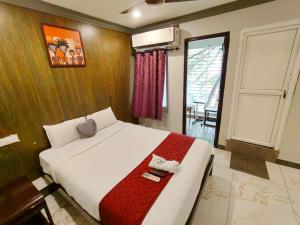 Ένα ή περισσότερα κρεβάτια σε δωμάτιο στο Sunrise Beach Resort +33 φωτογραφίες