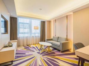 TV a/nebo společenská místnost v ubytování Lavande Hotels Xuzhou Yunlong Wanda Medical University