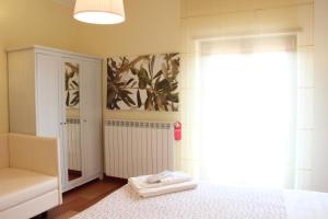 Postel nebo postele na pokoji v ubytování B&B da Peppe