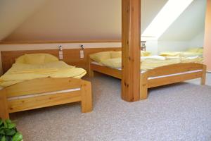 Voodi või voodid majutusasutuse Hotel Na Statku toas