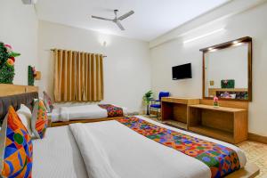 Ένα ή περισσότερα κρεβάτια σε δωμάτιο στο FabHotel A2 +20 φωτογραφίες