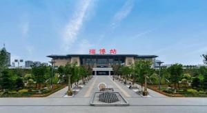 a large building with a pathway in front of it at 7 Days Premium Zibo Jinjing Avenue the Mixc in Zibo