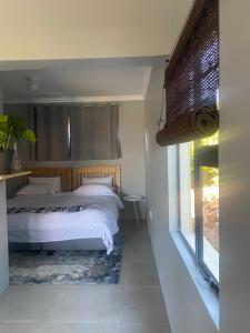 Postel nebo postele na pokoji v ubytování Pule's Home & Studio Apartments