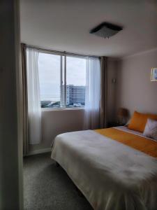 Postel nebo postele na pokoji v ubytování TERRA Ocean view to enjoy the sunset + 24 fotografií