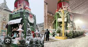 a display of christmas decorations in a building at AARON Apartament in Craiova