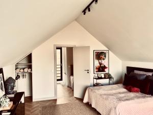 Ένα ή περισσότερα κρεβάτια σε δωμάτιο στο Hill41 kotlina kłodzka domki z sauną