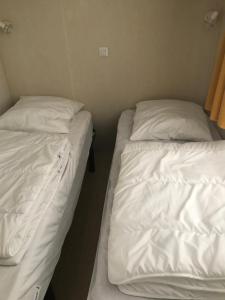 Кровать или кровати в номере Mobilhome confort 4-6 personnes