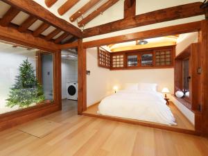 En eller flere senge i et værelse på 아린정