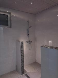 Koupelna v ubytování Snow-White Villa + 11 fotografií