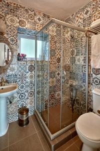 Koupelna v ubytování Mila House