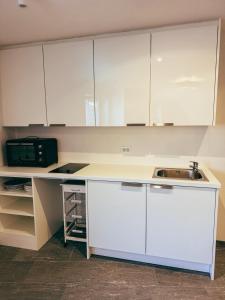 Η κουζίνα ή μικρή κουζίνα στο HEIMAT - Light Loft