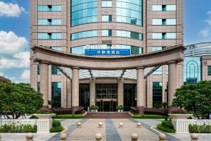 a rendering of the front of a building at Calmsea Hotel in Shenzhen