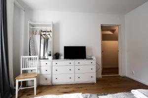 Μια τηλεόραση ή/και κέντρο ψυχαγωγίας στο Family & Worker Accommodations in Göteborg