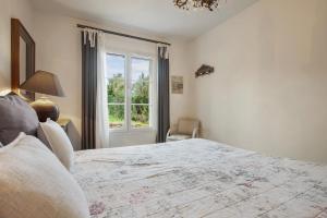 Postel nebo postele na pokoji v ubytování Le Mûrier + 22 fotografií