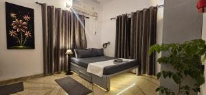 Postel nebo postele na pokoji v ubytování 3 Bedrooms ELements from Hexa Stays + 15 fotografií