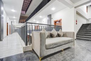 a couch in the hallway of a house at Townhouse Sector 102 Noida in Noida