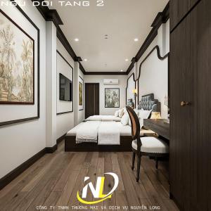 Una cama o camas en una habitación de Hanoi Silk Classy Hotel & Travel