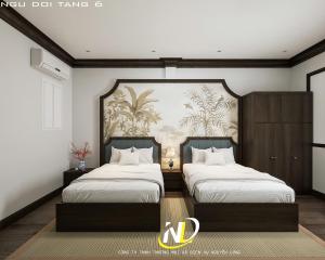 Un dormitorio con dos camas y un cuadro en la pared. en Hanoi S Premium hotel & Travel, en Hanói 7 fotos más