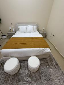 Postel nebo postele na pokoji v ubytování Bloomfields Modern 1Br Apt Brieki Al Ain