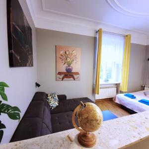 Postel nebo postele na pokoji v ubytování Willa Barona Przy Termach Cieplickich