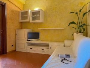 Et tv og/eller underholdning på Appartamento Lungomare - HelloElba