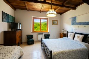 Postel nebo postele na pokoji v ubytování Selvicolle Country House