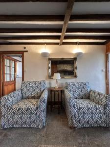 Et opholdsområde på Rustic Cottage in the countryside