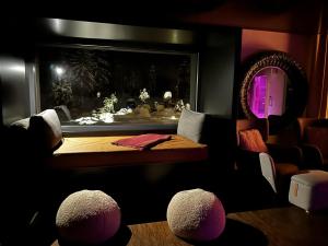 Χώρος καθιστικού στο ALPENGARTEN EIGENTHAL - Private Wellness Retreat +44 φωτογραφίες