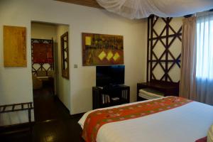 TV a/nebo společenská místnost v ubytování ViewPoint Ecolodge