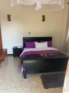 Postel nebo postele na pokoji v ubytování Montane Safaris Hotel FortPortal + 7 fotografií