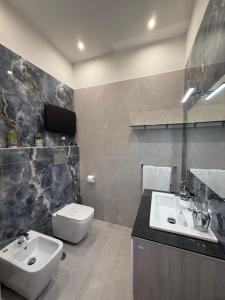 Koupelna v ubytování Ladi House