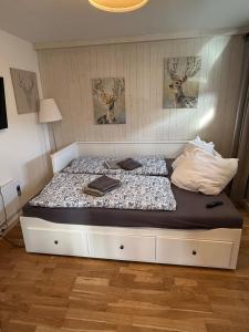 a large bed in a room with at Kreischberg Chalet Ferienpark 3 in Sankt Lorenzen ob Murau