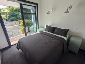 Postel nebo postele na pokoji v ubytování Minden Retreat + 8 fotografií