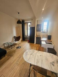 Posezení v ubytování appartement aux portes de Paris