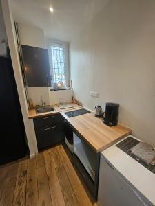 Kuchyň nebo kuchyňský kout v ubytování appartement aux portes de Paris
