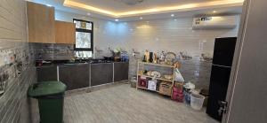 a kitchen with a sink and a counter top at Dareen Resort in Bahlāʼ