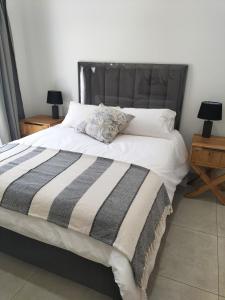 Postel nebo postele na pokoji v ubytování Atloch